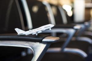 Small airplane model inside a large aircraft photo