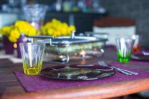 Closeup of beautiful color tableware for decorated table photo