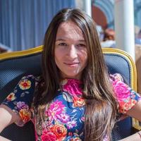 Beautiful woman at table in restaurant photo