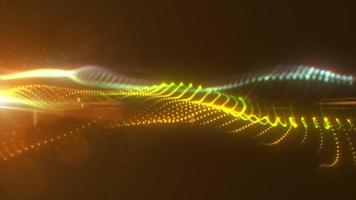 Ondas brillantes multicolores abstractas de partículas y puntos de energía mágica futurista de alta tecnología, fondo abstracto. video 4k, diseño de movimiento