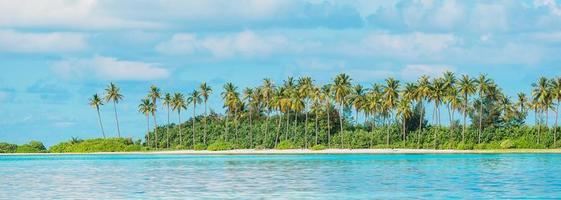 Perfect white beach with turquoise water at ideal island photo