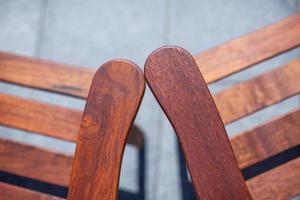 two wooden chairs in the garden photo