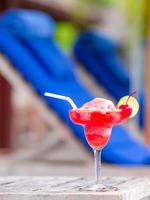 Tasty strawberry margarita background swimming pool photo