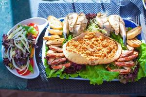 Seafood on the plate. Prepared Shellfish. photo