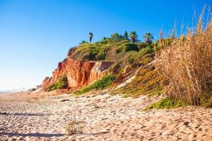 Big Mountain on the sand beach in Portugal photo