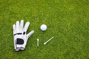 Golf equipment on green grass photo