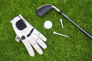 Golf equipment on green grass photo