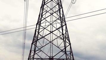 High voltage transmission towers with complex steel structures. video