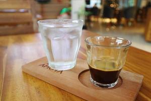 A bottle of V60 Japanese on a cafe table photo