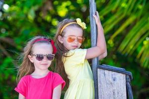 Adorable little girls during summer vacation photo