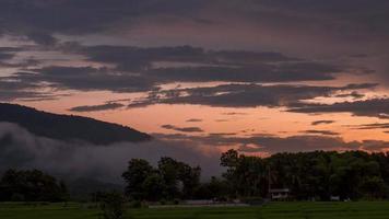 The flow of mist along the foothills In a rural area of Pua District, Nan Province, Thailand video