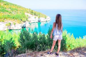 Little girl on vacation travel background beautiful landscape photo