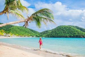 Caucasian girl with hat background the sea photo