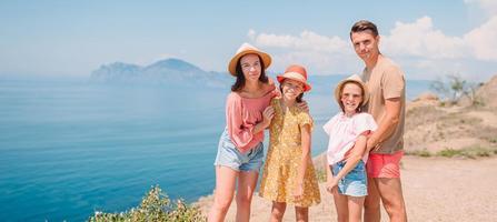 Happy family on vacation in the mountains photo