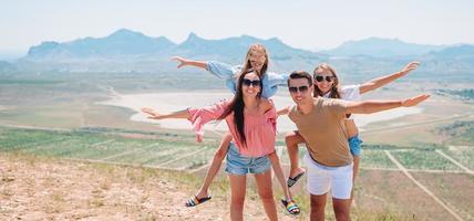 Happy family on vacation in the mountains photo