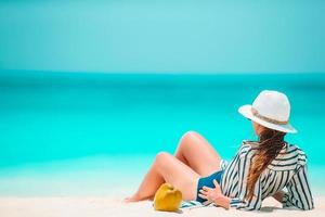 Young beautiful woman on beach vacation on Caribs photo