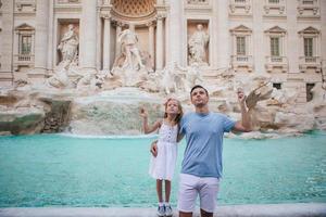 Happy kid and dad enjoy their european vacation in Italy photo
