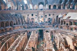 Colosseum background blue sky in Rome, Italy photo