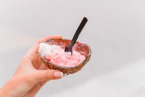 Coconut ice cream in the coconut shell photo