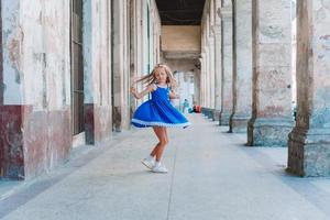 Tourist girl in popular area in Havana, Cuba. photo