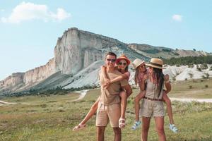 Happy family on vacation in the mountains photo