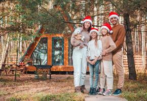 Beautiful family with kids walking at Christmas day photo