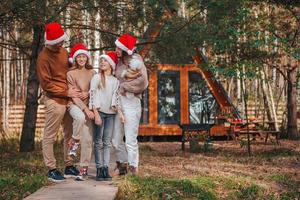 Beautiful family with kids walking at Christmas day photo