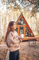 Beautiful girl walking at autumn warm day photo