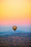 Bright hot air balloons in sky of Cappadocia, Turkey photo