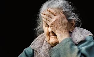 Portrait of a very old wrinkled woman photo