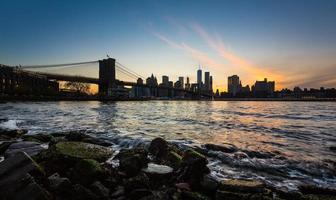 Manhattan skyline with Brooklyn Bridge photo