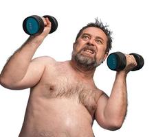 man exercising with dumbbells photo