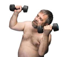 man exercising with dumbbells photo