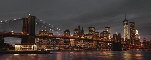 Brooklyn Bridge and Manhattan at sunset photo