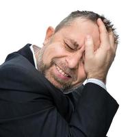 retrato de hombre con dolor de cabeza foto