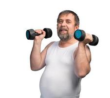 man exercising with dumbbells photo