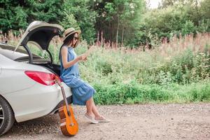 Young woman tourist enjoying on summer vacation photo