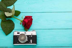 retro camera and roses - vedding love story concept copy space photo