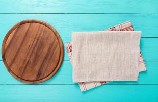 wooden table top view, desk for pizza with coloured napkins. Holiday, food concept photo