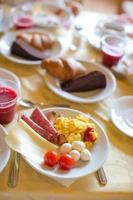 Healthy breakfast on the table close up in outdoor cafe photo