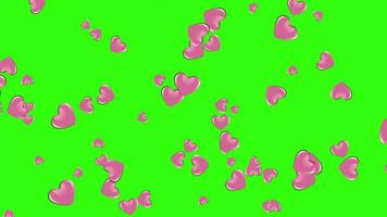 roze harten vorm in beweging animatie in groen scherm. video