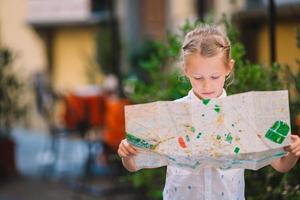 Adorable little girl enjoy italian vacation holiday in Europe. photo