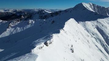 Amazing view of different mountain peaks with snow during winter. Beautiful mountain range and amazing attraction for alpine climbers. Adventurous lifestyle. Challenging mountain ridge for climbers. video