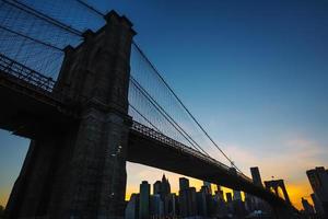 Manhattan skyline with Brooklyn Bridge photo