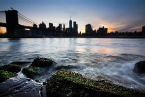 Manhattan skyline with Brooklyn Bridge photo