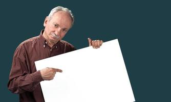 Senior man holds a blank board photo