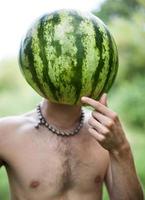 boy with a watermelon instead of head photo