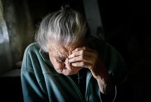 very old tired woman photo