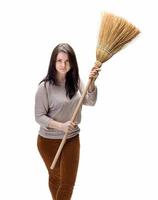 Young woman with a broom photo