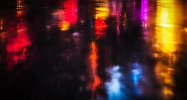 NYC streets after rain with reflections on wet asphalt photo